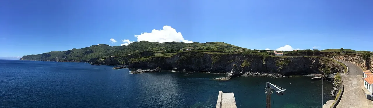 Steep cliffs and islets along the Flores coast near Ponta Delgada.