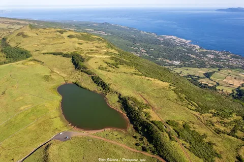 Lagoa do Capitão, a reed-fringed lake in Pico's highlands.