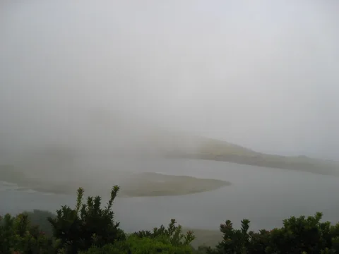 A lake inside a volcanic crater in Pico's highlands.